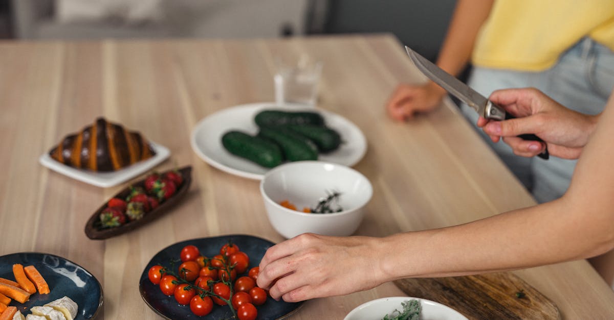 A phone showing a fasting timer alongside a meal tracking log